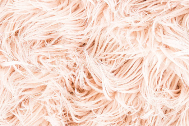 pink background with fluffy fur texture - Fotó, kép