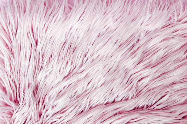 pink background with fluffy fur texture - Fotó, kép