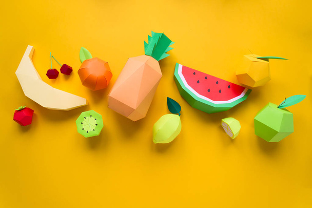 exotic fruits made of paper on yellow background - Foto, immagini