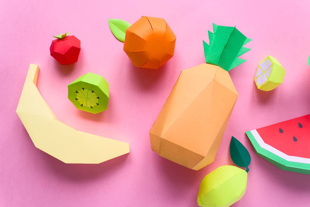 exotic fruits made of paper on pink background. Close up - Фото, зображення