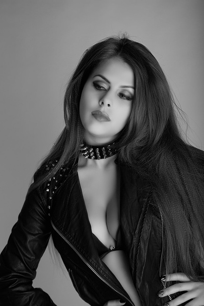 Beautiful portrait of rock woman in leather jacket - Photo, Image