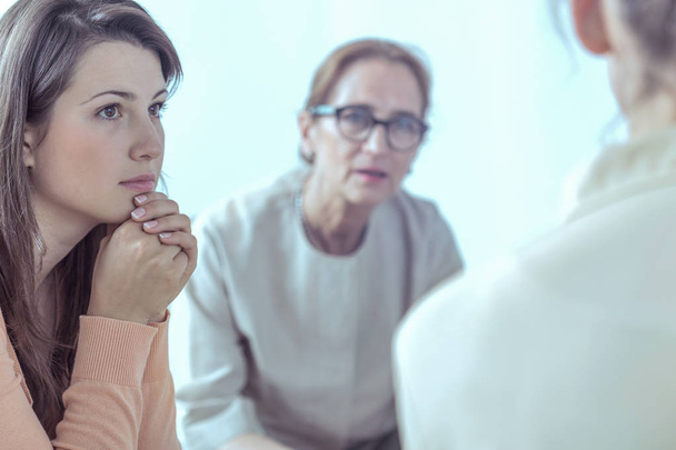 Woman and psychotherapist during meeting of support group - Foto, Imagem