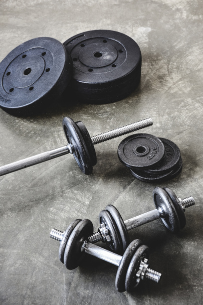 high angle view of gym equipment on concrete surface - Photo, image