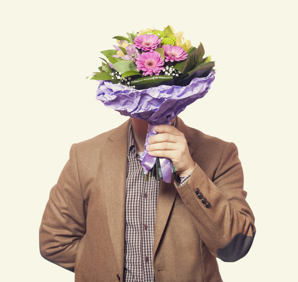 Man with flowers - Foto, immagini