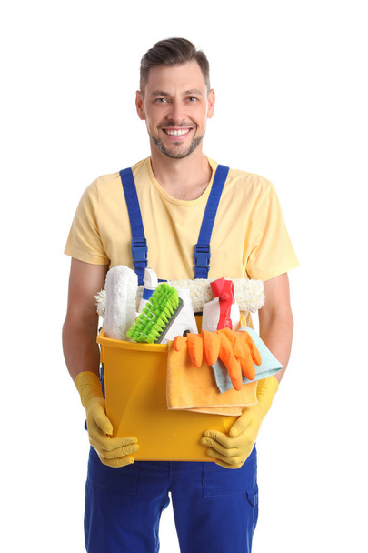Female janitors with cleaning equipment on white background - Valokuva, kuva
