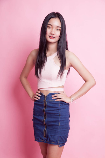 Portrait of beautiful young Asian woman on pink background - Fotografie, Obrázek