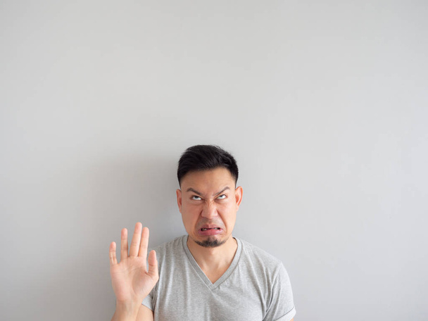 Funny face of Asian man denying something. - Fotoğraf, Görsel