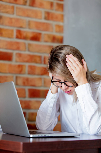 businesswoman with migraine on working place - Photo, image