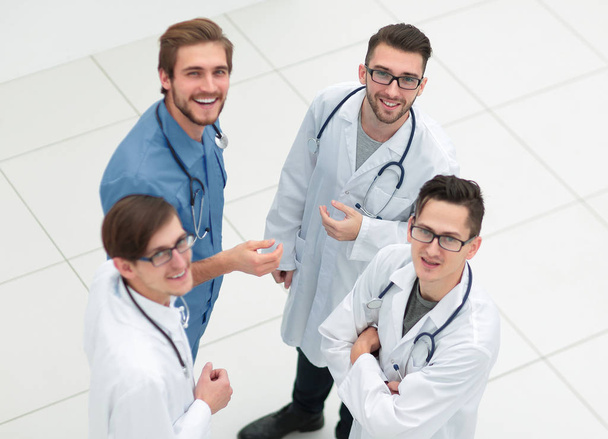 smiling group of doctors discussing - Photo, image