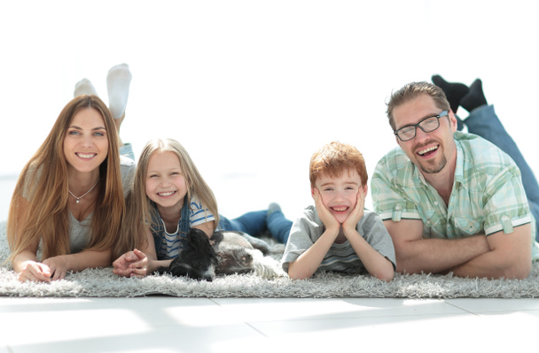background image of a happy family in a new apartment - Fotoğraf, Görsel
