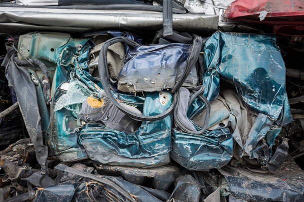 Cars in junkyard,  pressed and packed for recycling.  - Photo, Image