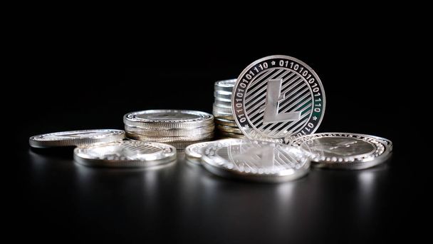 Litecoin Crypto Currency. Coins on a Dark Background - Zdjęcie, obraz