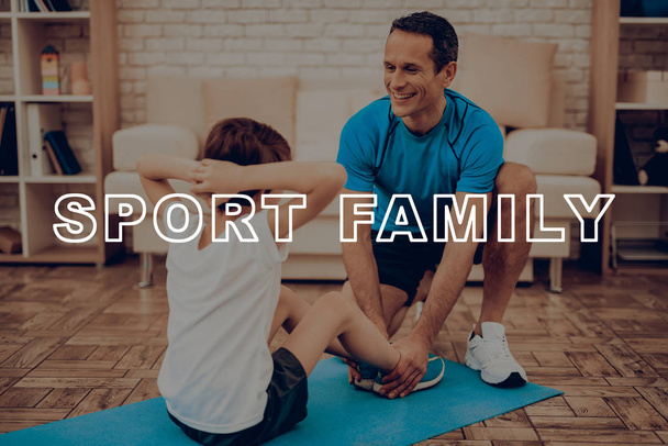 Father And Son Are Doing Gym. Sport Family. Healthy Lifestyle. Active Holiday. Exercises Clothes. Getting Better. Working Out At Home. Gym Carpet. Repeating Practice. Press Shaping. - Photo, Image