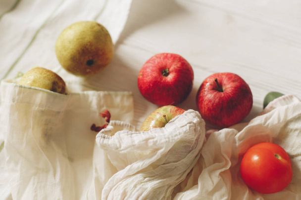 eco natural bags with fruits, eco friendly. sustainable lifestyle concept. zero waste food shopping. plastic free items. reuse, reduce, recycle, refuse. groceries in eco bags - Photo, Image