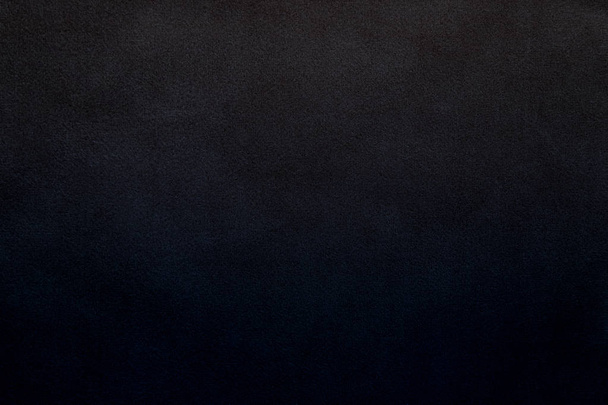 abstracte zwarte achtergrond met textuur van de stof - Foto, afbeelding
