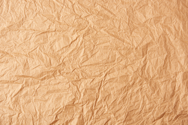 pełna klatka beżowy zmięty papier jako tło - Zdjęcie, obraz