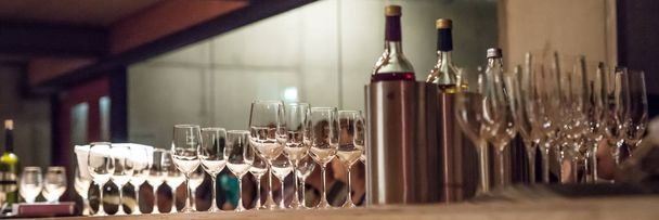 Various wines and glasses prepared in the wine cellar. Various wine tastings - Photo, Image