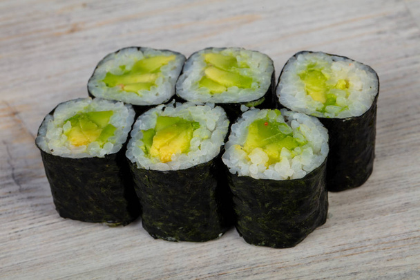 Japanese traditional roll with avocado - Fotó, kép