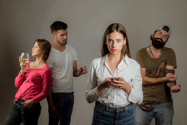 Social Media Today. People hands addicted by mobile smart phone. Addicted to social networking. Stop game addiction. Sad teenage girl with social problems. - Фото, зображення