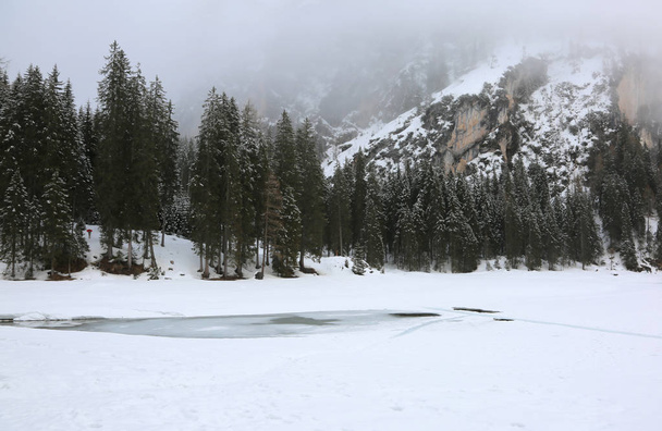 pragser wildsee called Lago di Braies in Italian Language in Northern Italy in winter - Zdjęcie, obraz