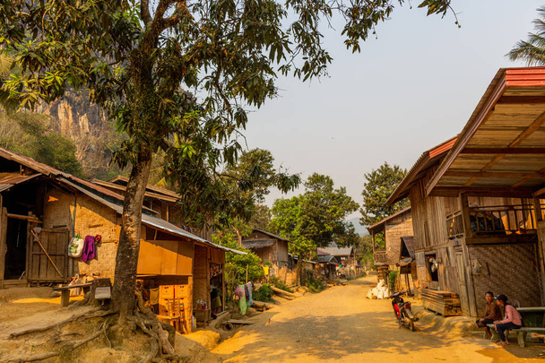 Ban Na, Laos - April 10, 2018: Slow life in a remote rural ethnic village of northern Laos - Photo, Image