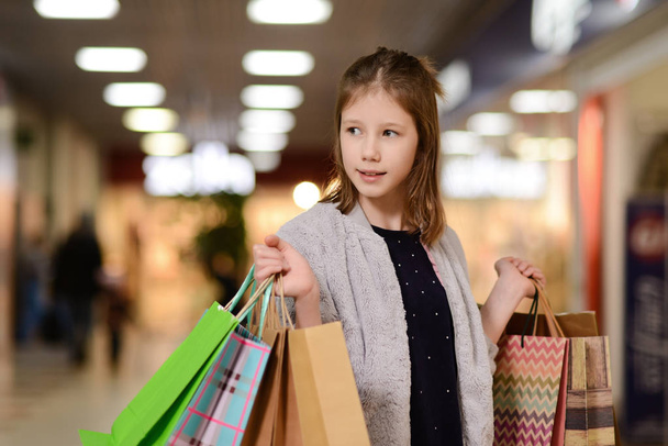 girls go shopping , buy and measure things - Photo, Image