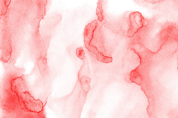 Red abstract watercolor stains and blots with a solid background on a paper texture. - Photo, Image