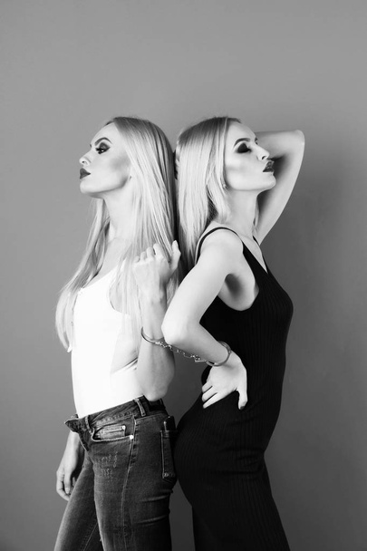 women twins, friends with bright makeup - Foto, imagen