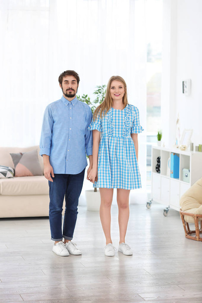 Portrait of young loving couple at home - Photo, Image