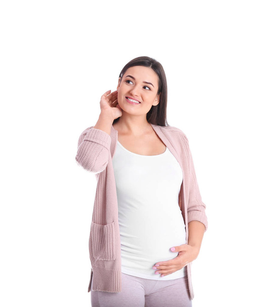 Beautiful pregnant young woman on white background - Fotoğraf, Görsel