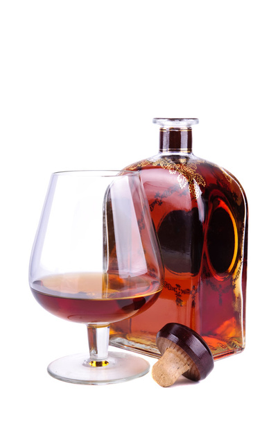 Glas und Flasche Cognac - Foto, Bild