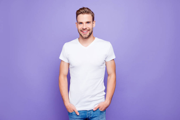 Handsome attractive bearded content guy in white tshirt and jean - Foto, imagen
