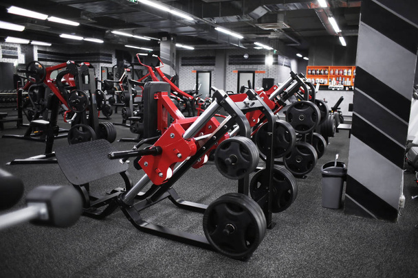Modern equipment in new gym indoors - Photo, Image