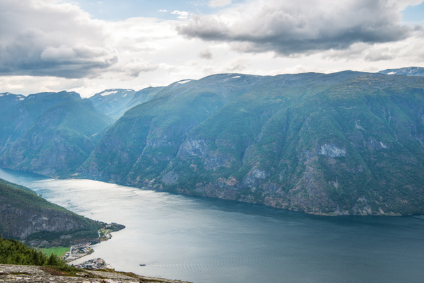 majestic landscape with sea and Aurlandsfjord from Stegastein viewpoint, Aurland, Norway - Fotó, kép