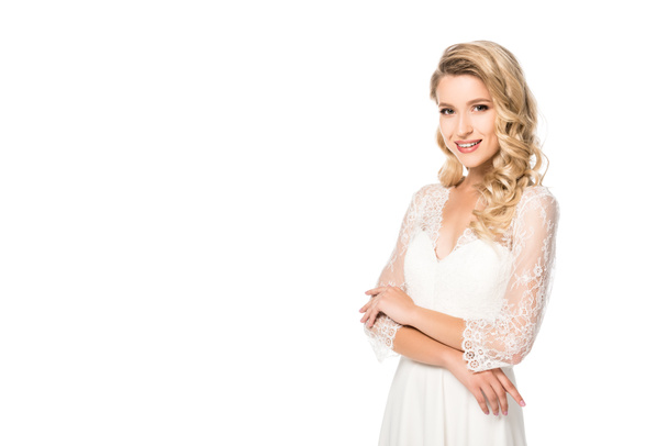 smiling young bride in wedding dress looking at camera isolated on white - Φωτογραφία, εικόνα