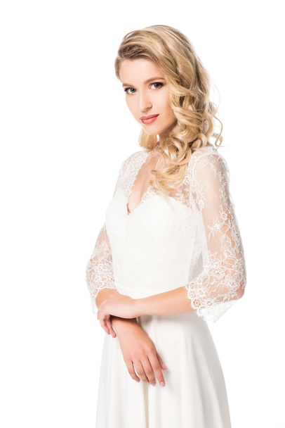 beautiful young bride in wedding dress looking at camera isolated on white - Zdjęcie, obraz