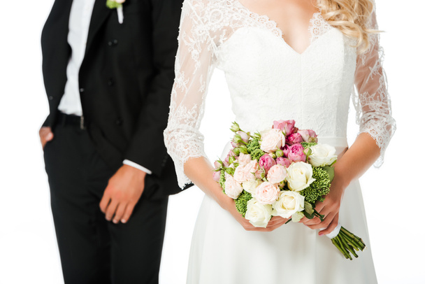 cropped shot of bride with bouquet and groom isolated on white - Zdjęcie, obraz