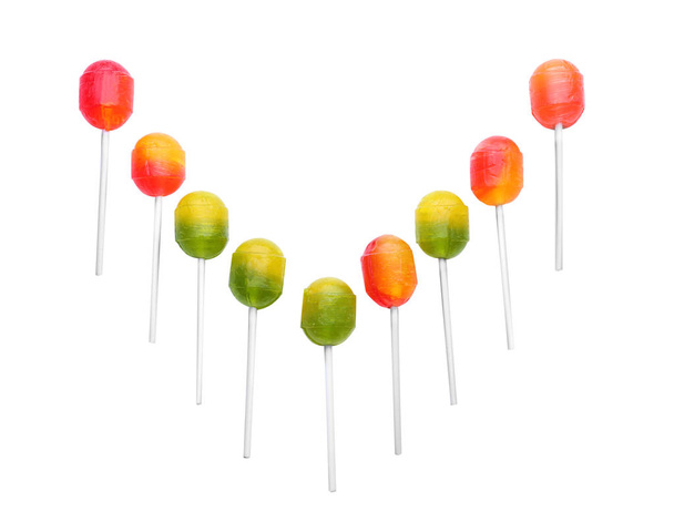 Colorful lollipops on white background - Photo, Image
