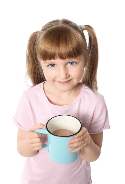 Cute little girl with cup of hot cocoa drink on white background - Foto, Imagem