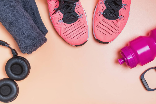Fitness accessories like sneakers, bottle with water and other - 写真・画像