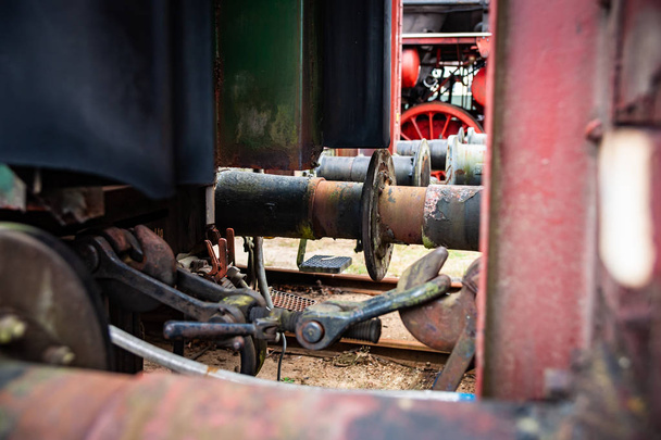Details and different images of locomotives, marshalling yard, wagons, carriages and train stations in an old industrial heritage museum in the netherlands at Beekbergen - Photo, Image