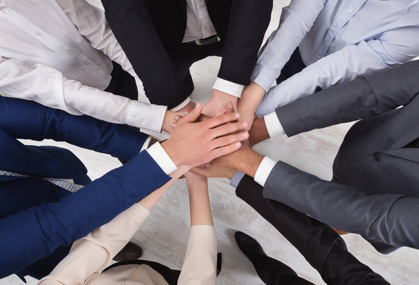 Top view of young business people hands - Photo, Image