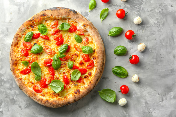 Delicious pizza on grey background - Foto, immagini