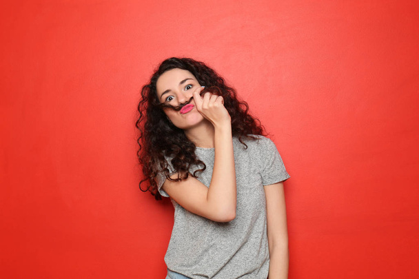 Portrait of funny emotional girl on color background - Фото, изображение