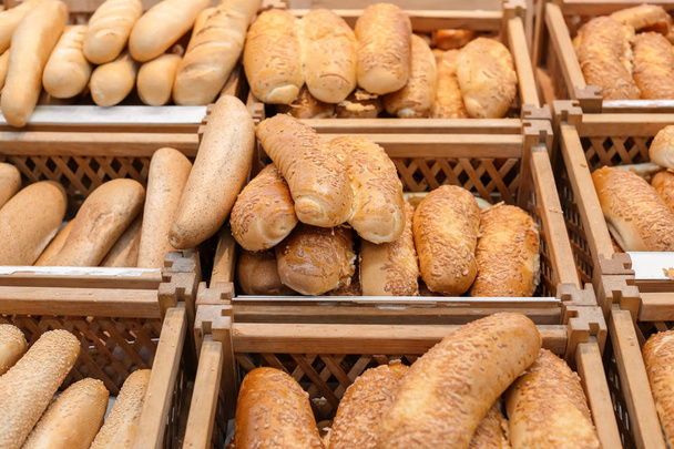 Fresh tasty bread in supermarket - Fotoğraf, Görsel