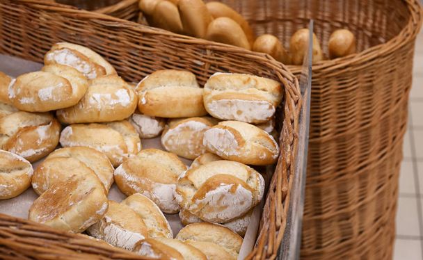 Fresh tasty bakery in wicker basket - Photo, Image
