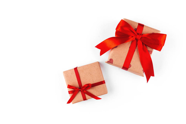 gift parcel box with ribbon bow, isolated on white - 写真・画像