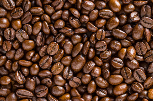 Pattern of roasted coffee beans. Texture. - Foto, afbeelding