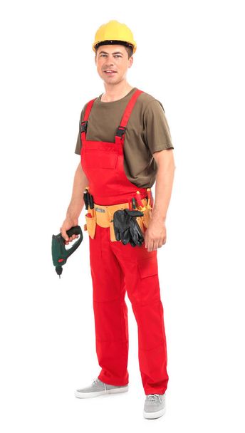 Electrician with drill and tools on white background - Φωτογραφία, εικόνα