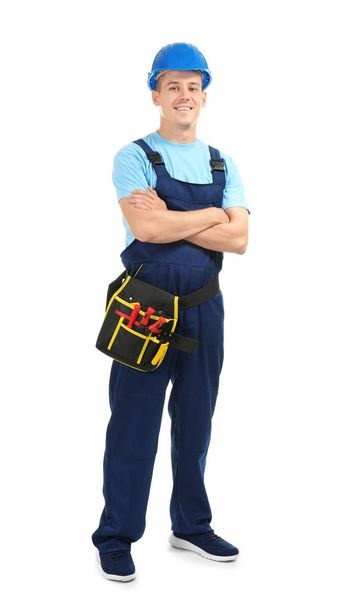 Electrician with tools on white background - Φωτογραφία, εικόνα